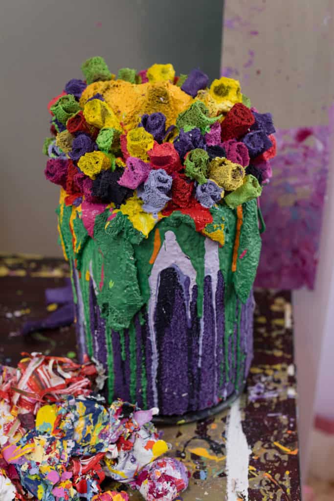Colorful strips of sponge have been cut to form a bouquet of "flowers" in a vase